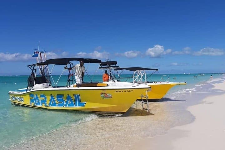 Guests enjoying parasailing with Captain Marvin's Watersports