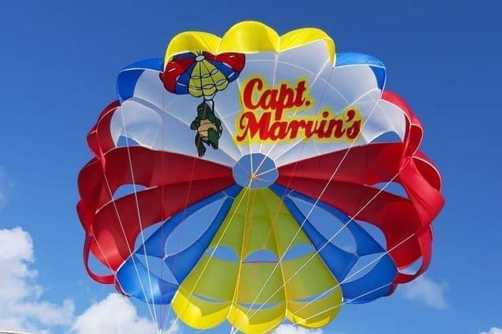 Parasailing over Grace Bay Beach, Turks and Caicos